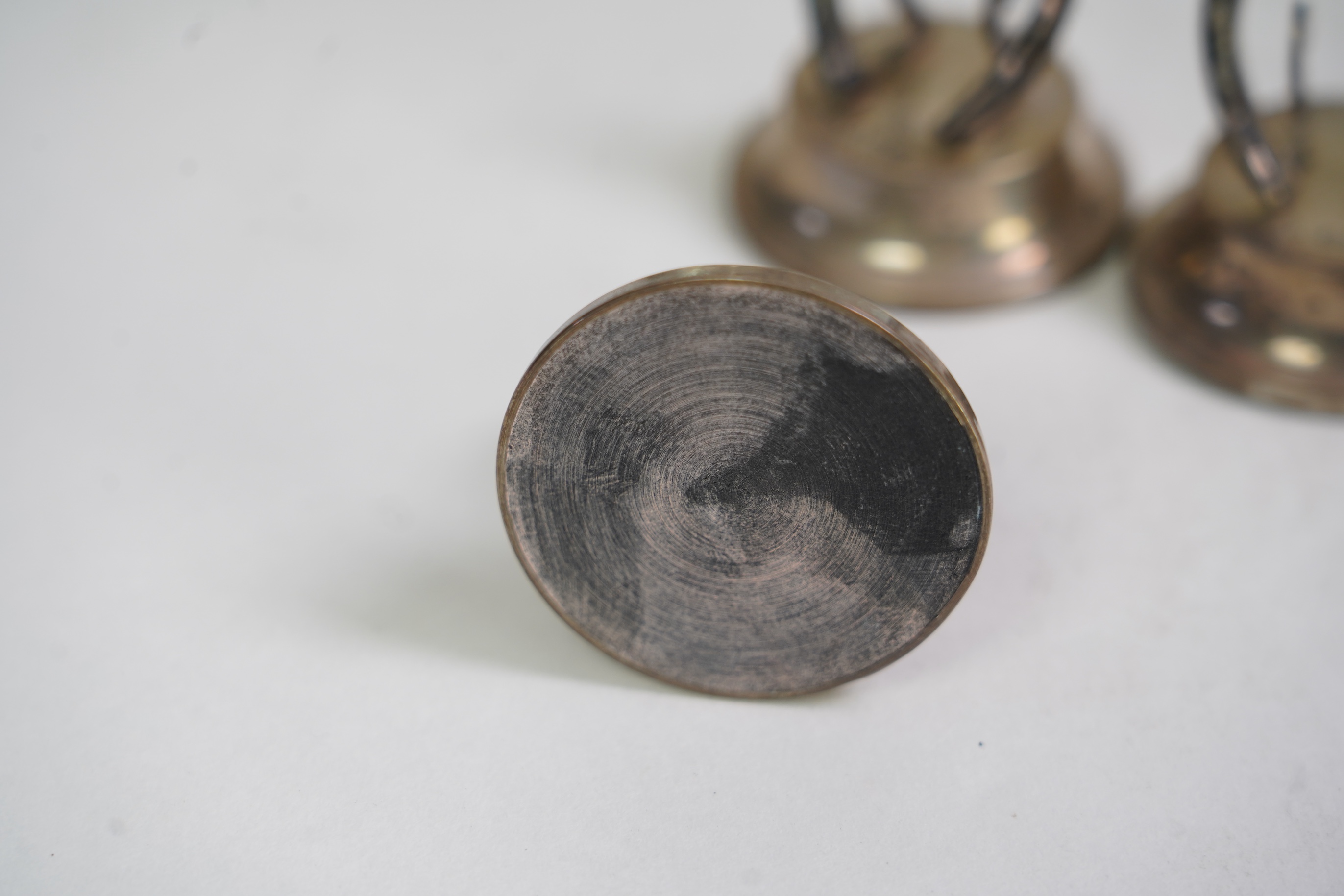 A cased set of four Edwardian silver horseshoe menu holders, by Levi & Salaman